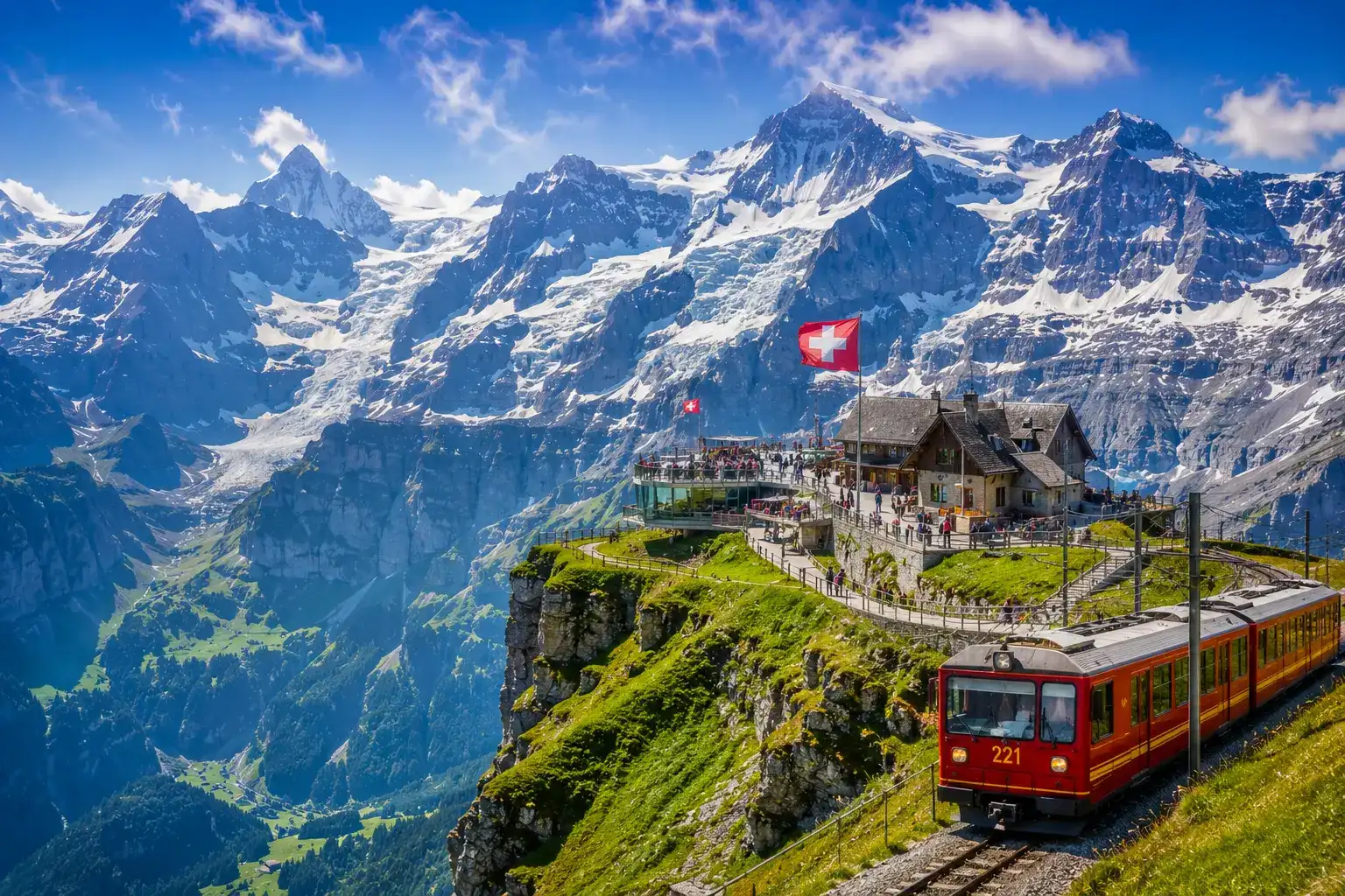 Jungfrau Region mountain railway with panoramic views of the Eiger, Mönch, and Jungfrau peaks in the Swiss Alps.